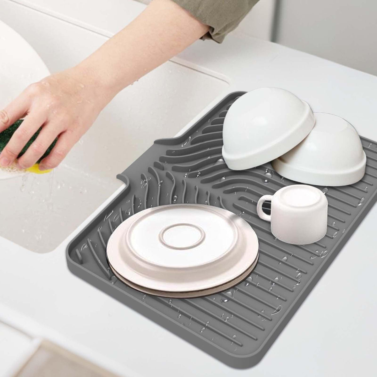 GUUKIN dish drying mat on countertop keeps dishes dry and ready.