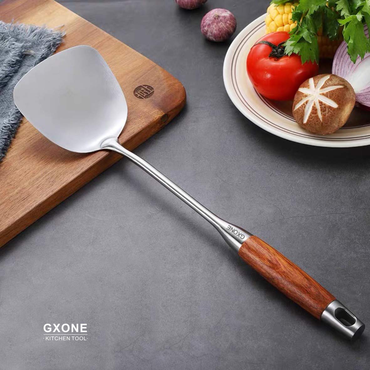 GXONE stainless steel wok utensil resists denting and chipping during busy cooking.