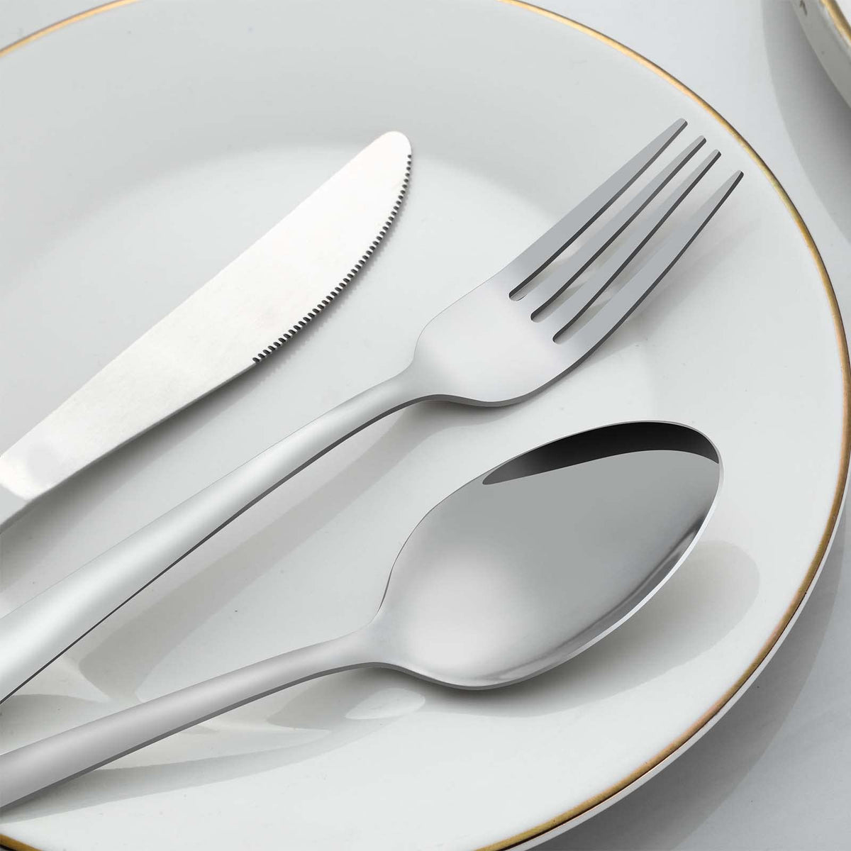 Gymdin dinner spoons in rust resistant stainless steel for lasting reliability.