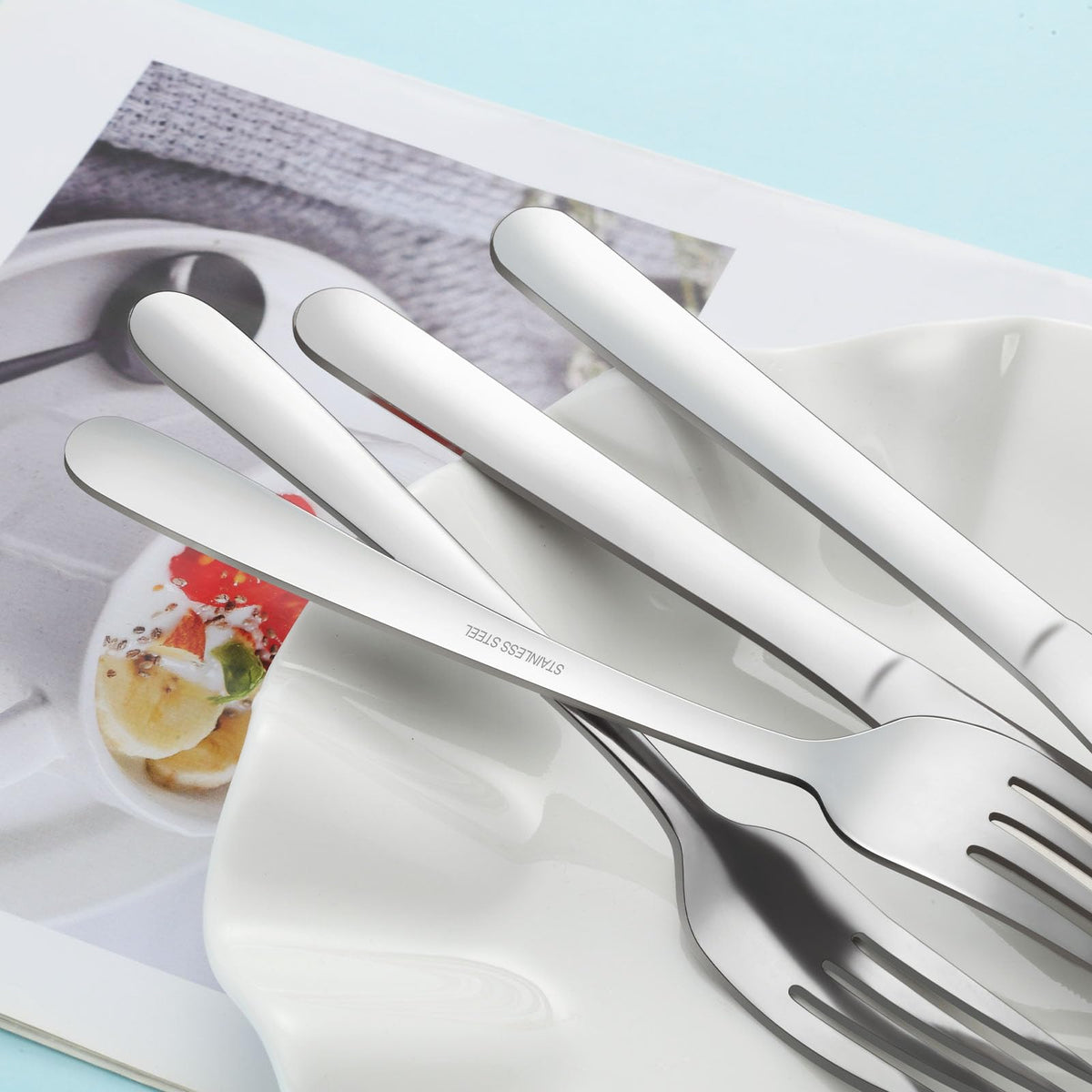 Gymdin mirror-polished flatware adds elegant shine to your table setting.