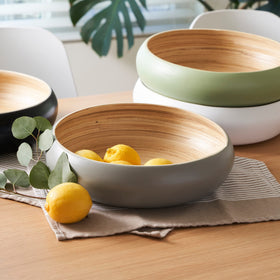 Habitaas exterior white fruit bowl complements a minimalist kitchen design.