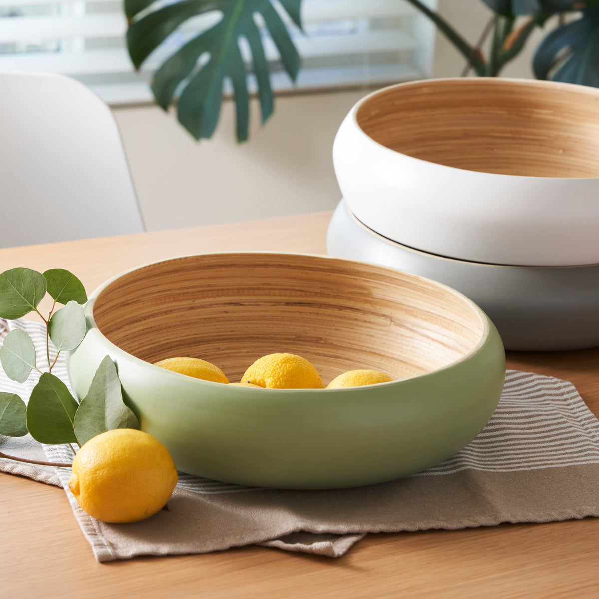 HABITAAS sage fruit bowl used as decorative centerpiece in living space.