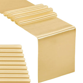 Hahuho satin table runner in light gold on a dining table for an elegant setup