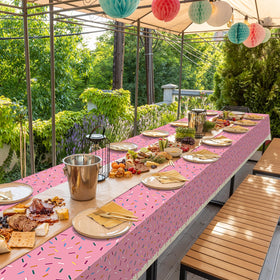 Hallswl large rectangle table cover protects surfaces while creating a sweet, festive table setting.