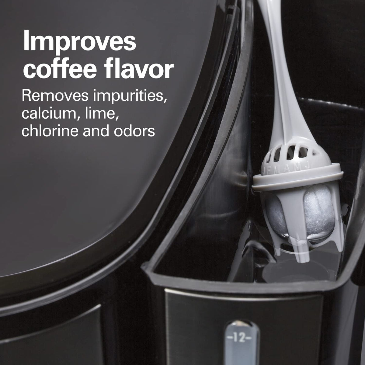 Hamilton Beach filter replacement cap demonstrates easy pull-off for quick maintenance.