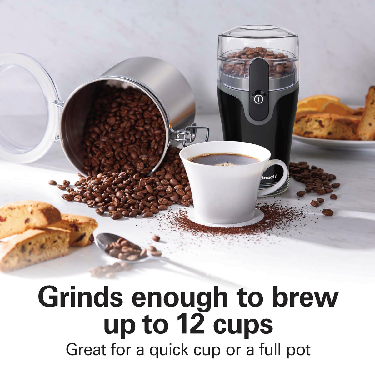 Stainless steel blades power through beans and spices for versatile grinding.