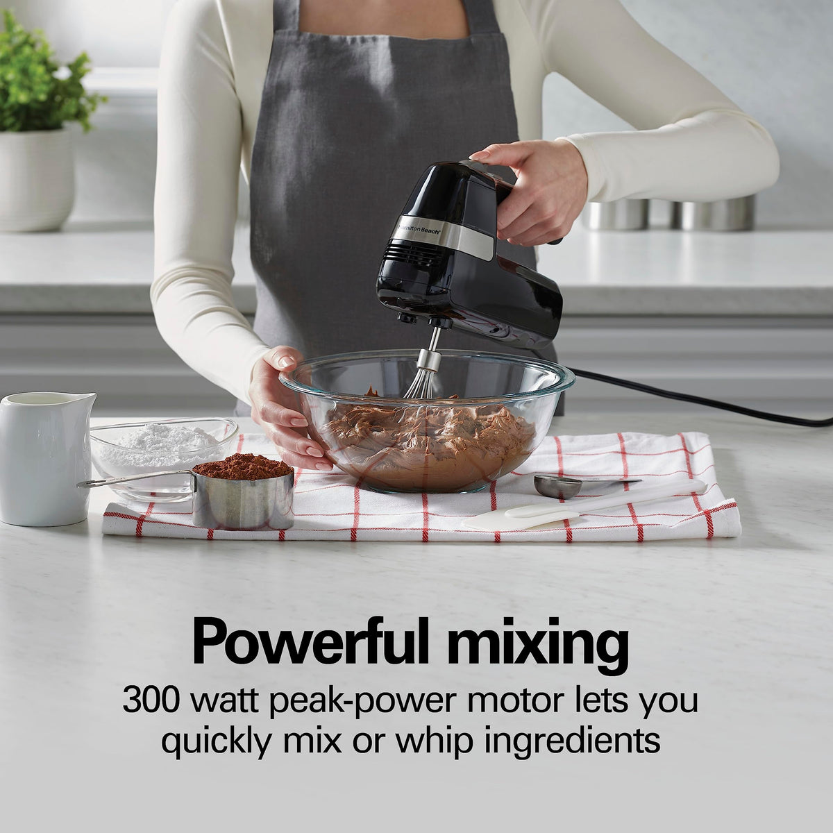 Hamilton Beach hand mixer powered by a 300-watt motor for quick results.