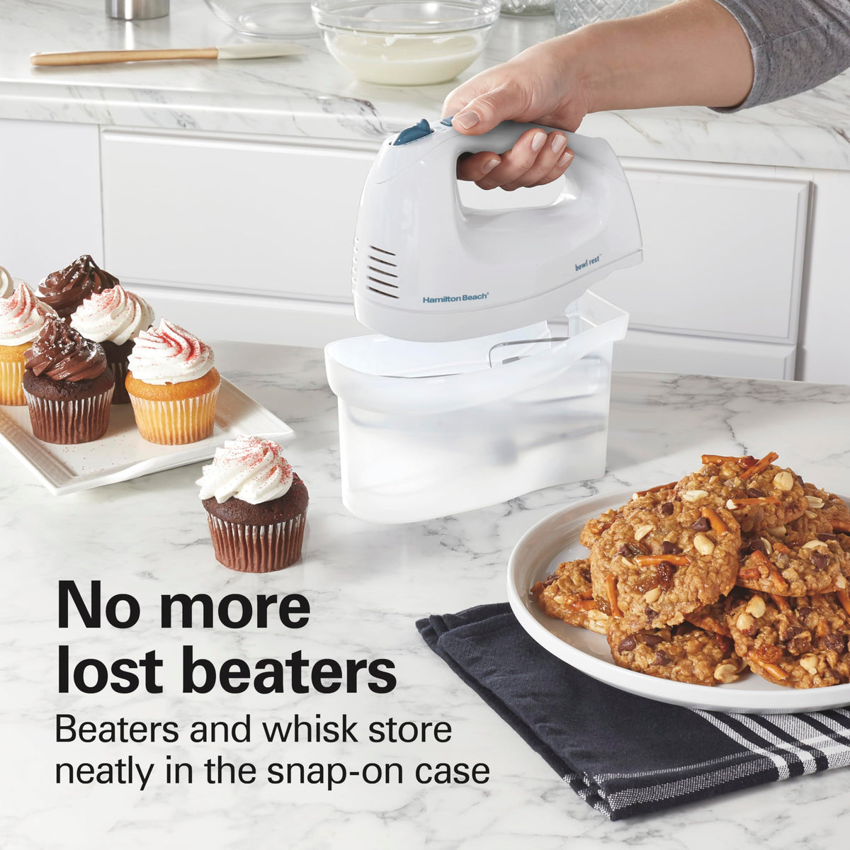 Hamilton Beach hand mixer attachments with beaters and whisk ready for mixing