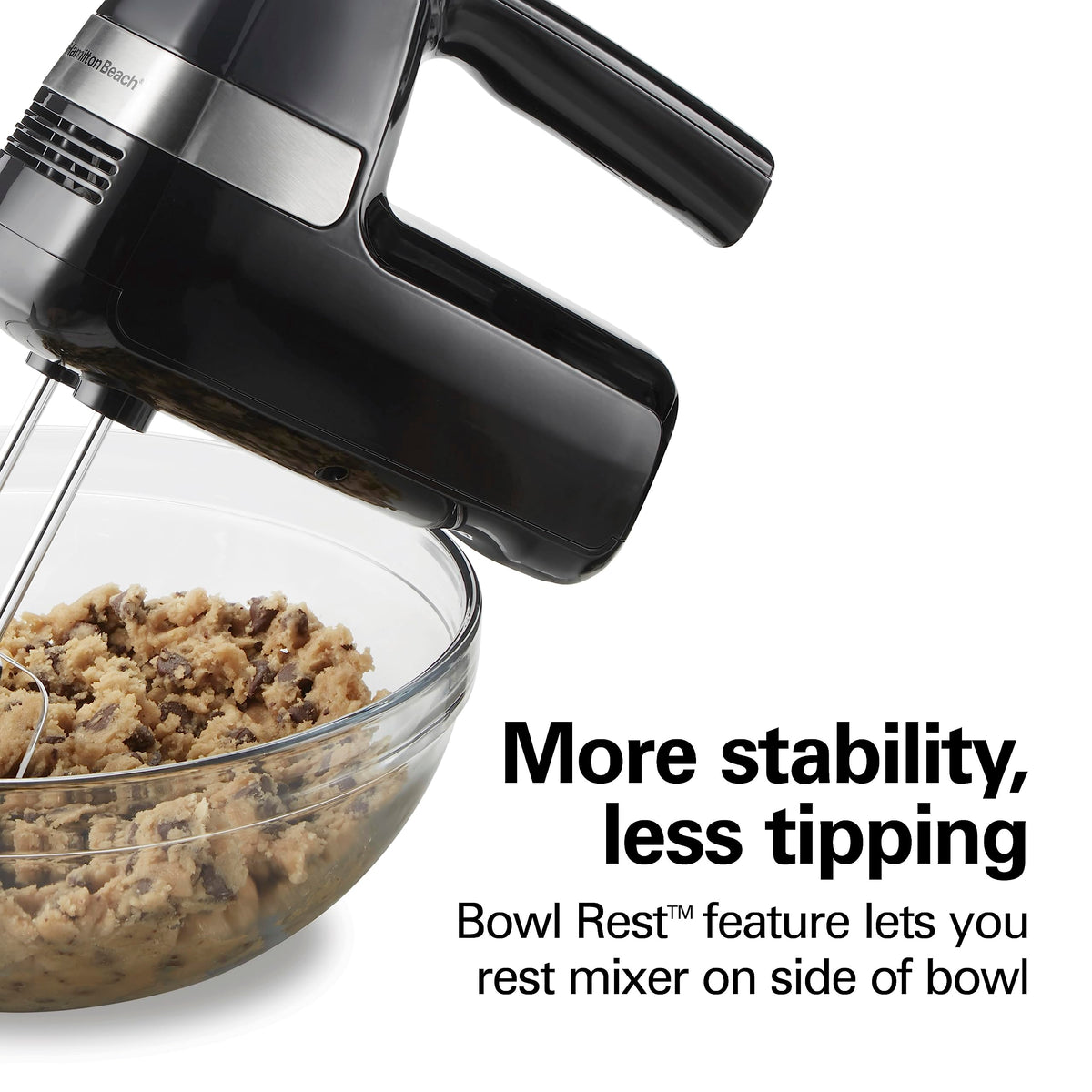 Hamilton Beach hand mixer resting on bowl edge with Bowl Rest feature.