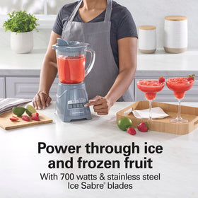 Hamilton Beach Power Elite blender with ice-sabre blades crushing ice for icy drinks.