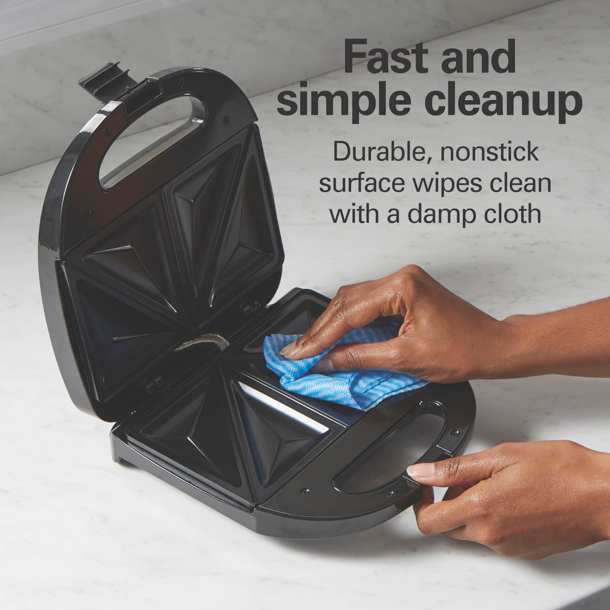 Two-position lid lock on Hamilton Beach sandwich maker enables thicker fillings