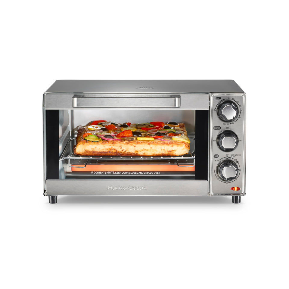 Hamilton Beach toaster oven on counter showing 4-slice capacity for quick breakfasts