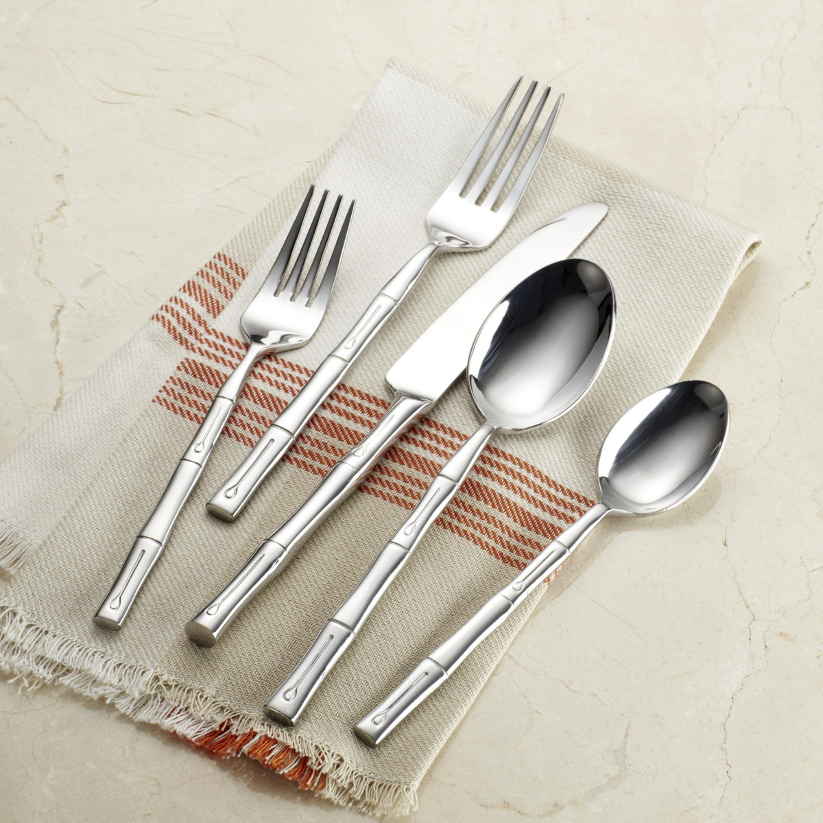 Hampton Forge Bamboo dinner fork with broad tines for reliable cutting.