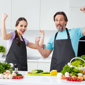 Handepo striped black apron in kitchen scene for cooking and baking.