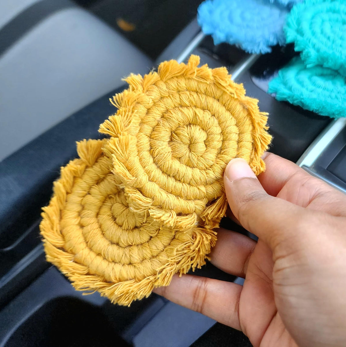 Macrame weave detail on Uruba coaster highlighting handmade quality.