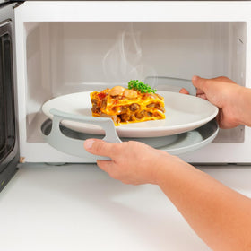 Handy Gourmet Microwave Cool Caddy carrying tray supports stable serving.
