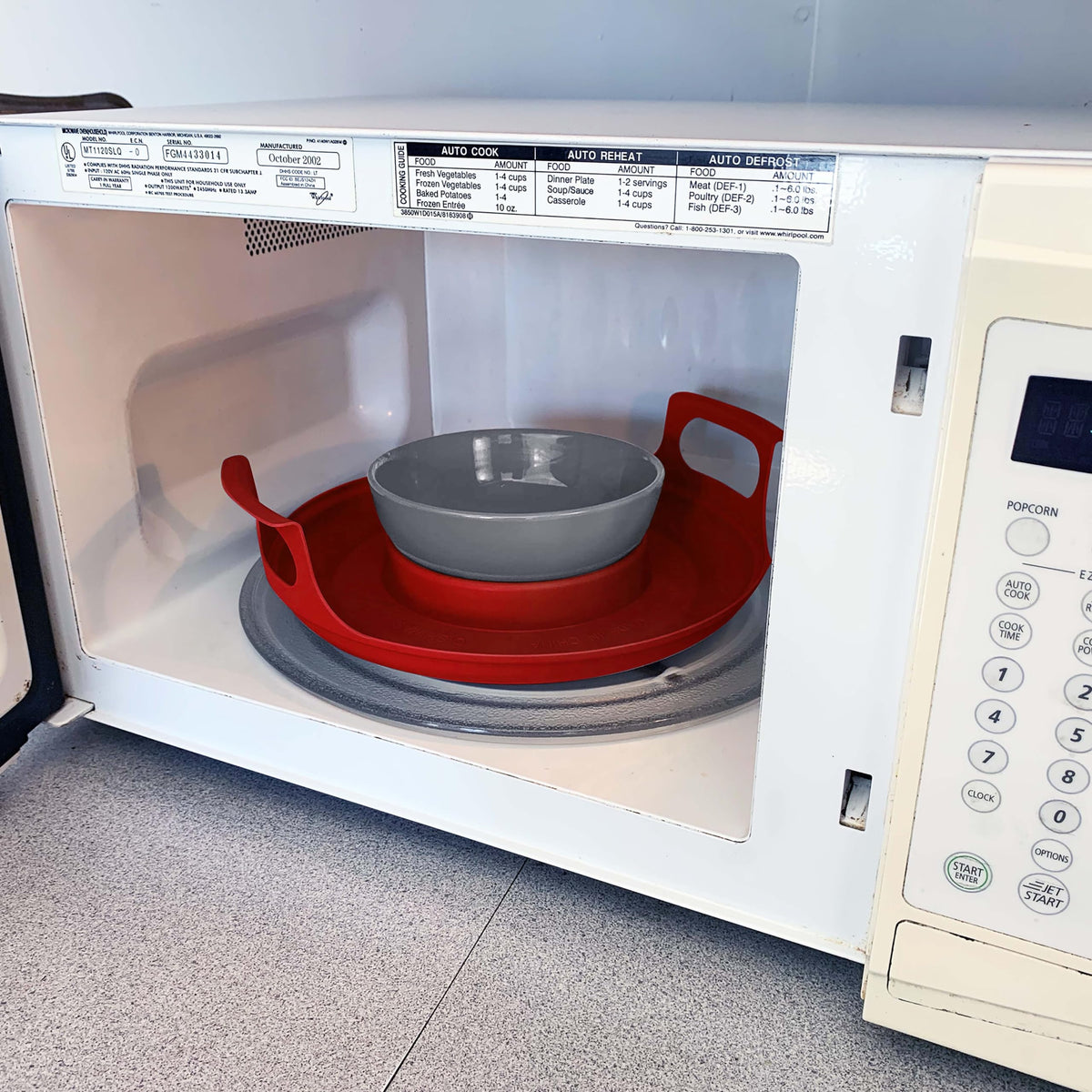 Handy Gourmet red microwave caddy fits bowls and plates.
