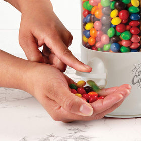 Handy Gourmet triple candy machine top-fill cap facilitates quick refilling.