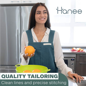 HANEE cross-back straps on deep teal apron demonstrate comfortable wear