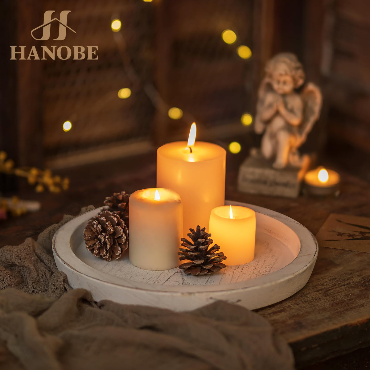 Hanobe candle holder plate on the round tray creates cozy centerpiece ideas.