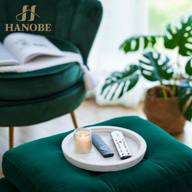 Hanobe round tray on kitchen island as a decor-focused serving surface.