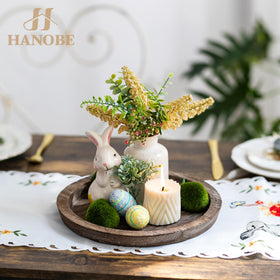 Hanobe wooden tray on kitchen island with flowers for a vibrant display.