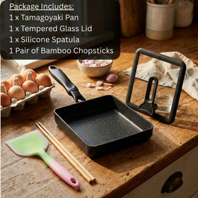 HAPPI STUDIO Tamagoyaki Pan with spatula aids smooth rolling.