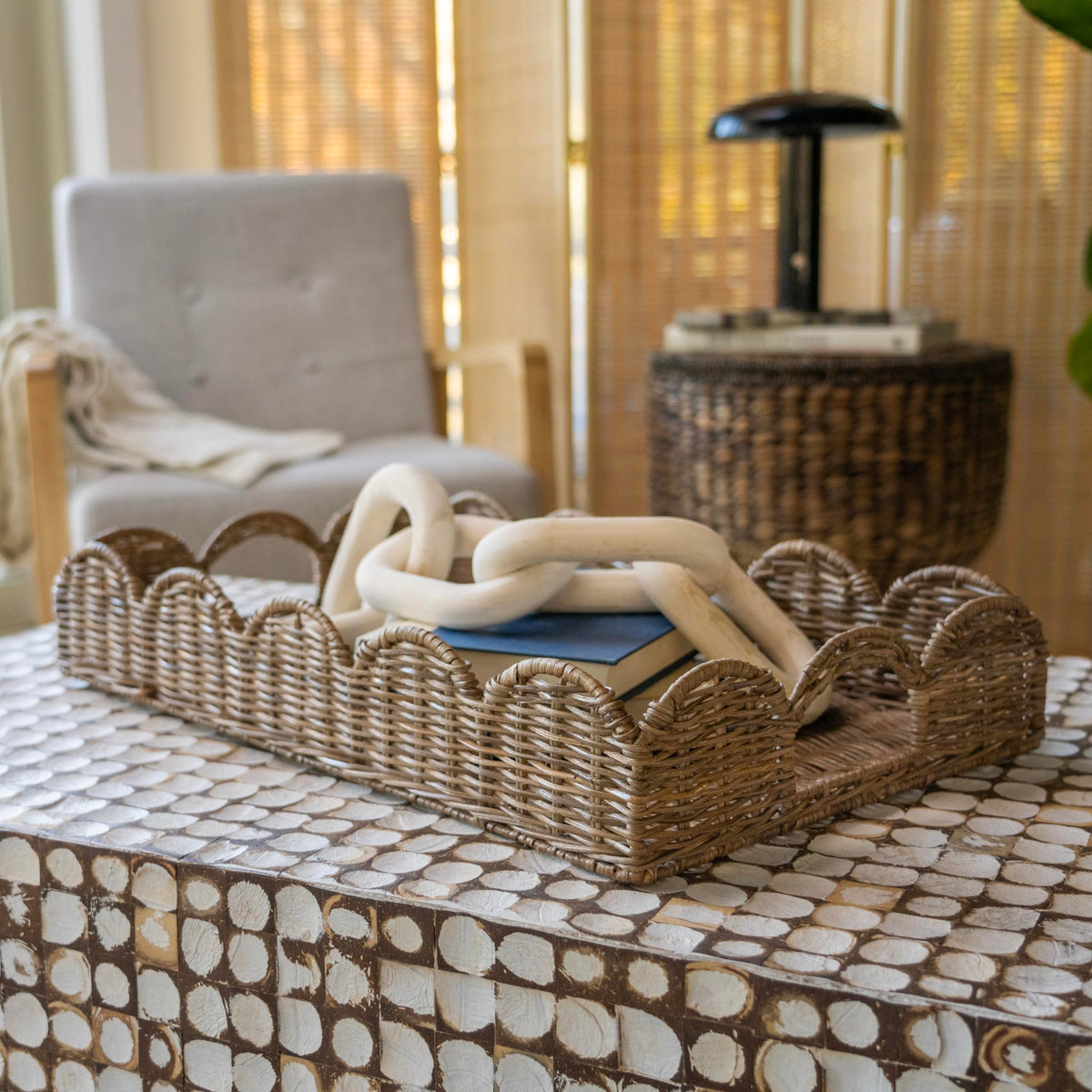 Happimess tray on coffee table organizes items with chic display.