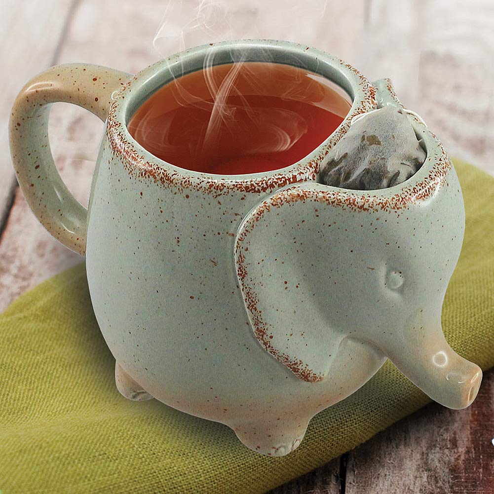 Happiness Apply Here elephant tea mug in green, perfect for cozy tea breaks with tea bag holder.