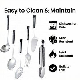 Happy Kit slotted spoon with perforated bowl for draining liquids.
