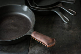 Hardmill leather handle cover close-up highlighting heat-resistant stitching