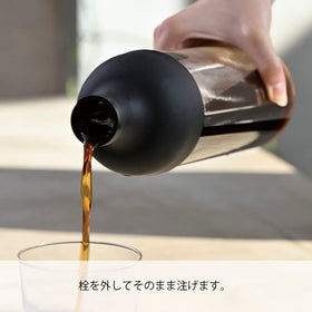 HARIO bottle stored in fridge door, keeping cold brew ready.