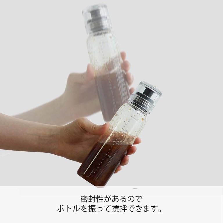 Hario dressing bottle demonstrating odor and leak protection on a pantry shelf.