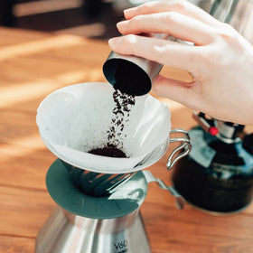 Hario Outdoor V60 metal dripper cone-shaped for deeper coffee layering and refined texture.