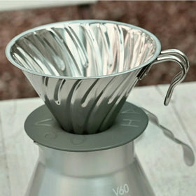 Hario Outdoor V60 metal dripper with removable base, easy to clean and store.