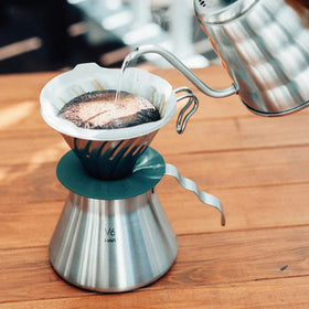 Hario Outdoor V60 metal dripper spiral ridges guiding even pour and balanced extraction.