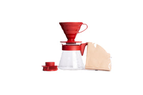 Hario V60 02 plastic coffee dripper with precise pour control.