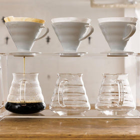 Hario V60 ceramic dripper heat retention red – maintains brewing temperature.