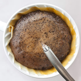 Hario V60 Dripper 02 White cone-filter detail emphasizes controlled water flow