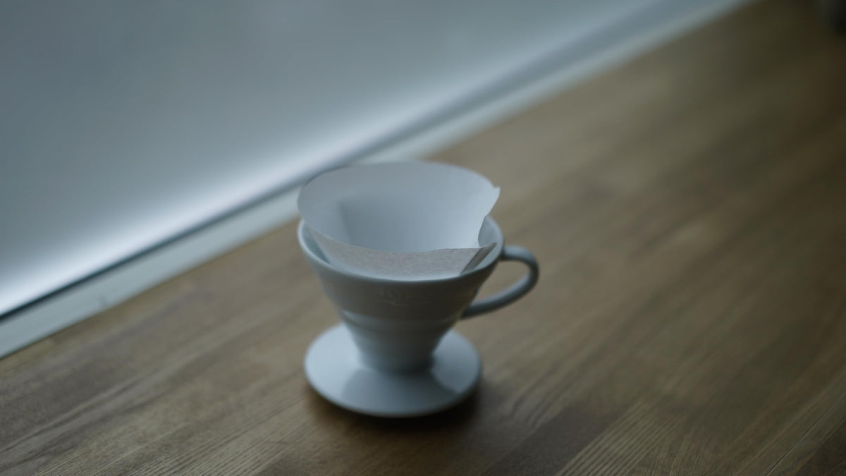 HARIO V60 filter box open shows convenient disposal after brewing.