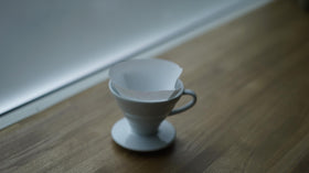 HARIO V60 filter box open shows convenient disposal after brewing.