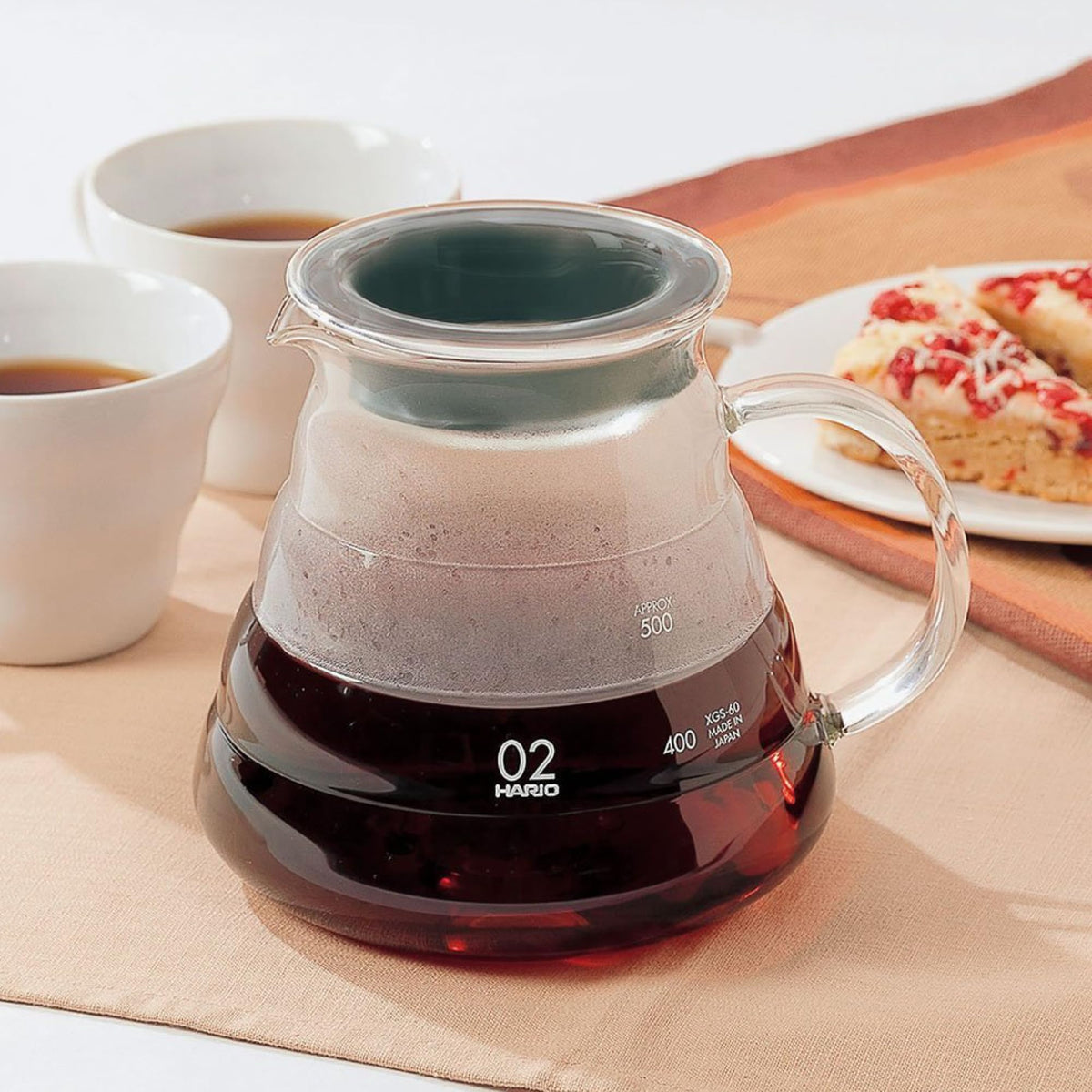Hario V60 glass range coffee server 600ml, side view showing heat-proof glass for hot brews.