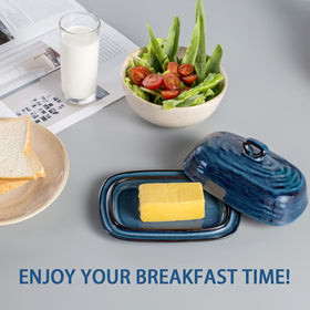 Hasense butter dish blue countertop with butter stick visible