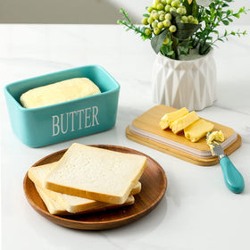 HASENSE butter dish turquoise base with knife ready for serving.