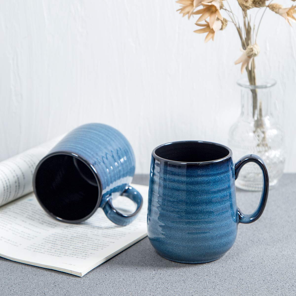 Hasense porcelain mugs next to tea and cocoa options