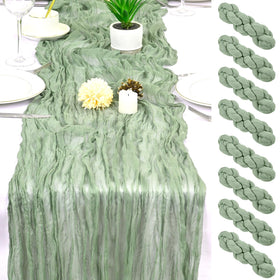 HASJOIN sage green cheesecloth table runner draped elegantly for wedding decor.