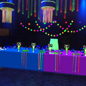 Hauwellter neon tablecloth glow under UV blacklight for standout decor.