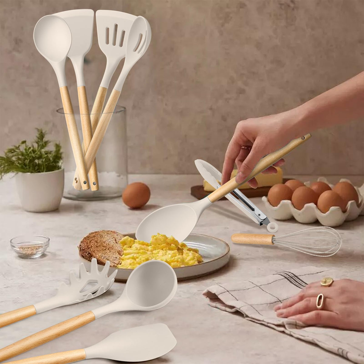 HaWare silicone soup ladle with wooden handle for easy serving.