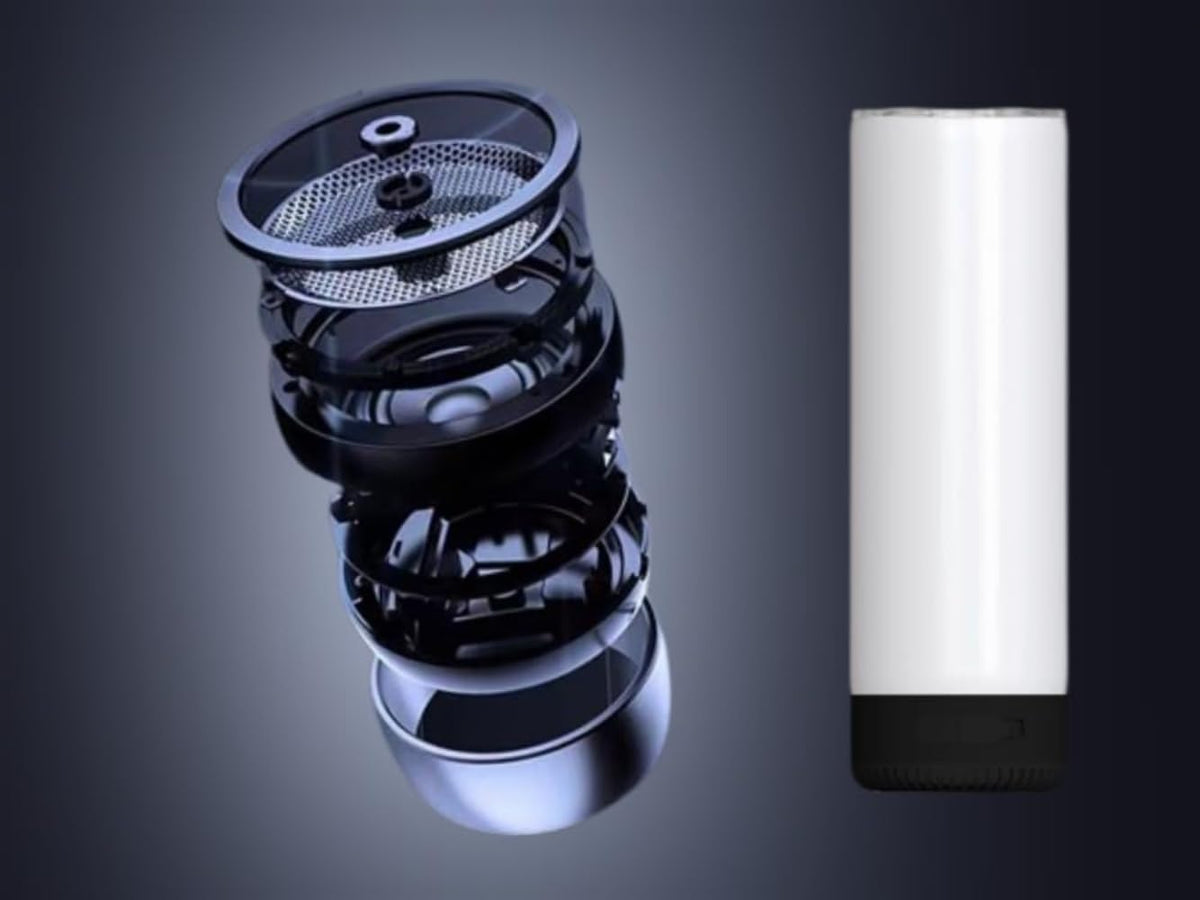Hayins Bluetooth sublimation tumbler with lid in use at an outdoor gathering.