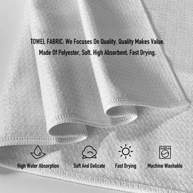 Hcaredee waffle weave towels absorb moisture during kitchen cleanup tasks.